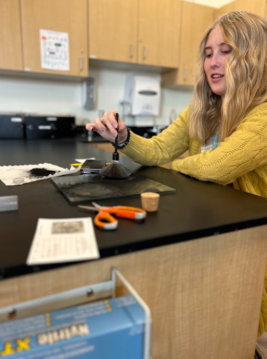 CLC School Police Officer Helps Forensic Students Learn How To Lift Finger Prints