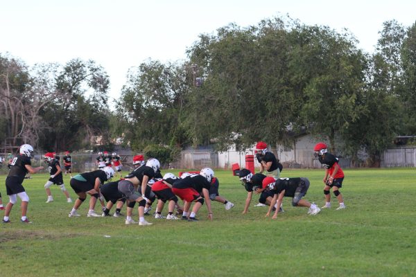 Varsity football team practices at GHS 