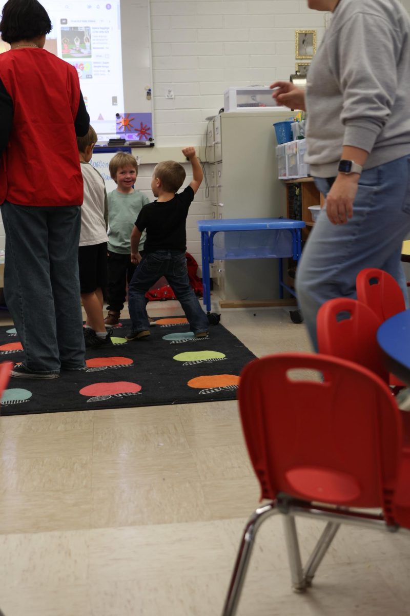 Two students having a mini dance party 