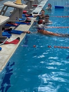 Swim kids practicing in the water this morning