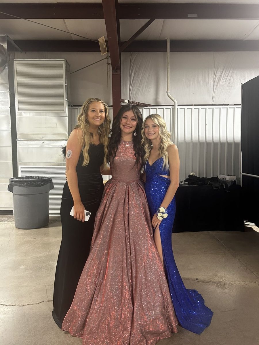 Brooklynn Hunsaker and Jasmine Barker and there friend at cowboy prom. 12/3 