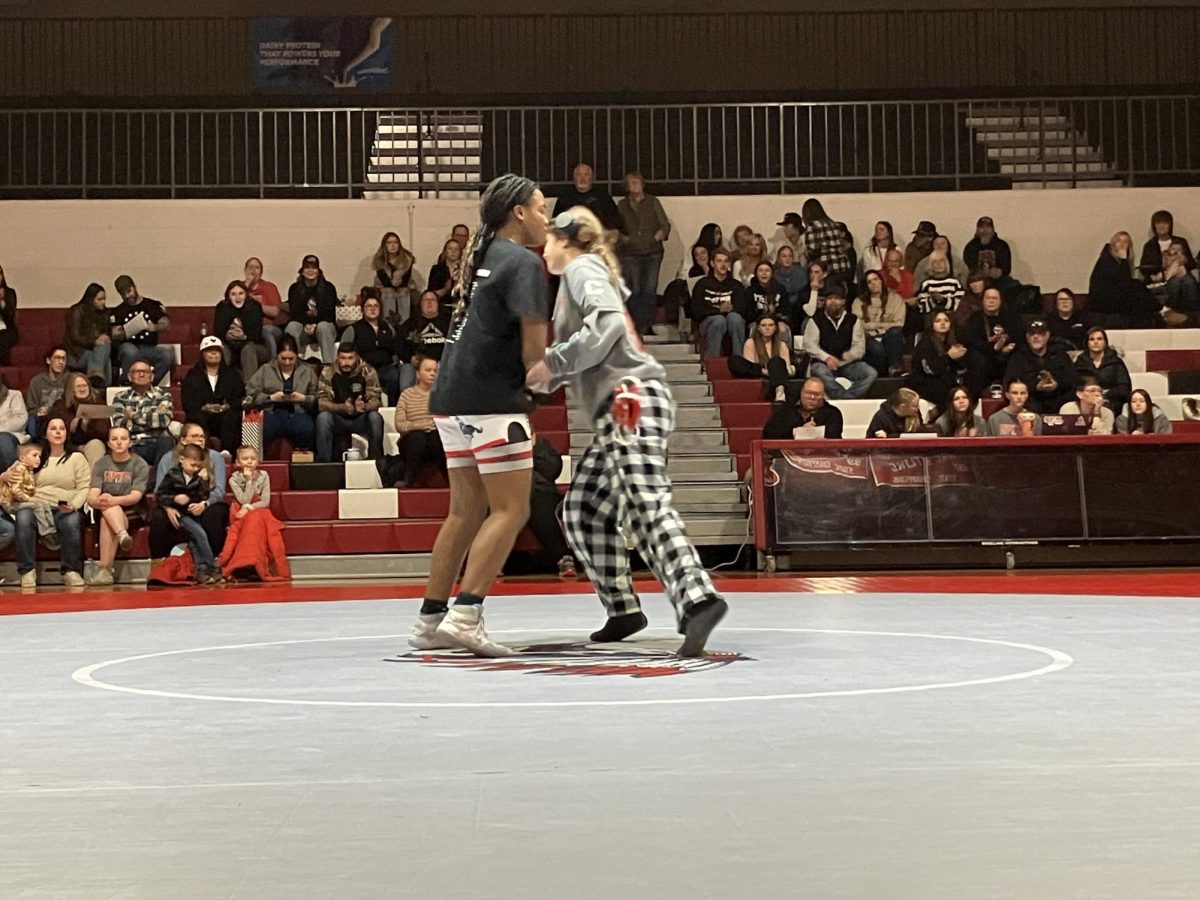 Grantsville’s Courtney Mecham during the face off against Uintah’s Ciele Richardson for the 145 weight class