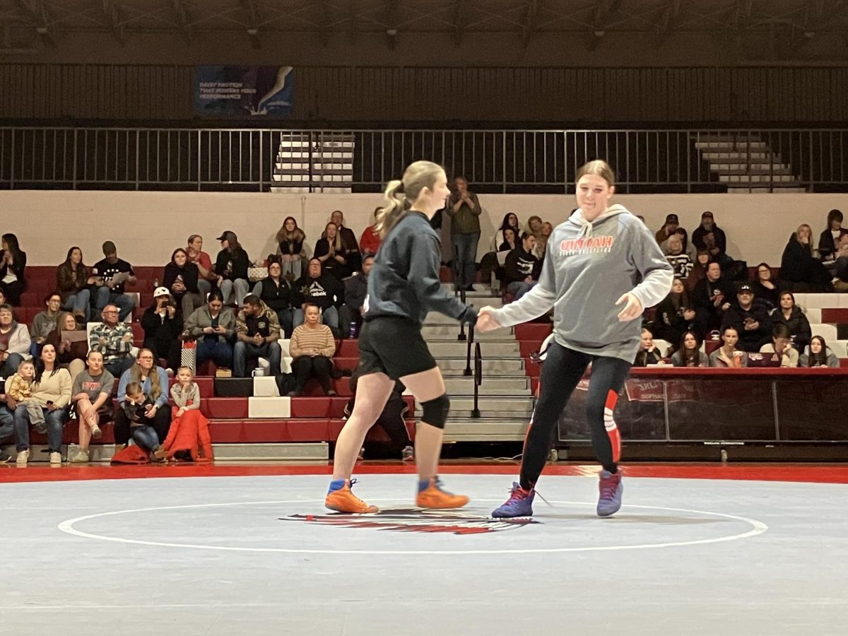 Grantsville’s Hailey Broderick during the face off against Uintah’s Kambre Wihelm for the 155 weight class 