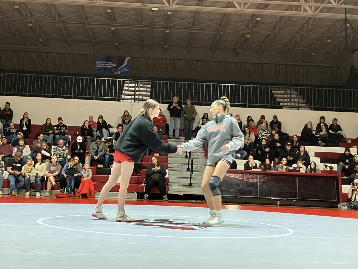 Grantsville’s Zivah Sires during the face off against Uintah’s Kenna McCauley for the 100 weight class