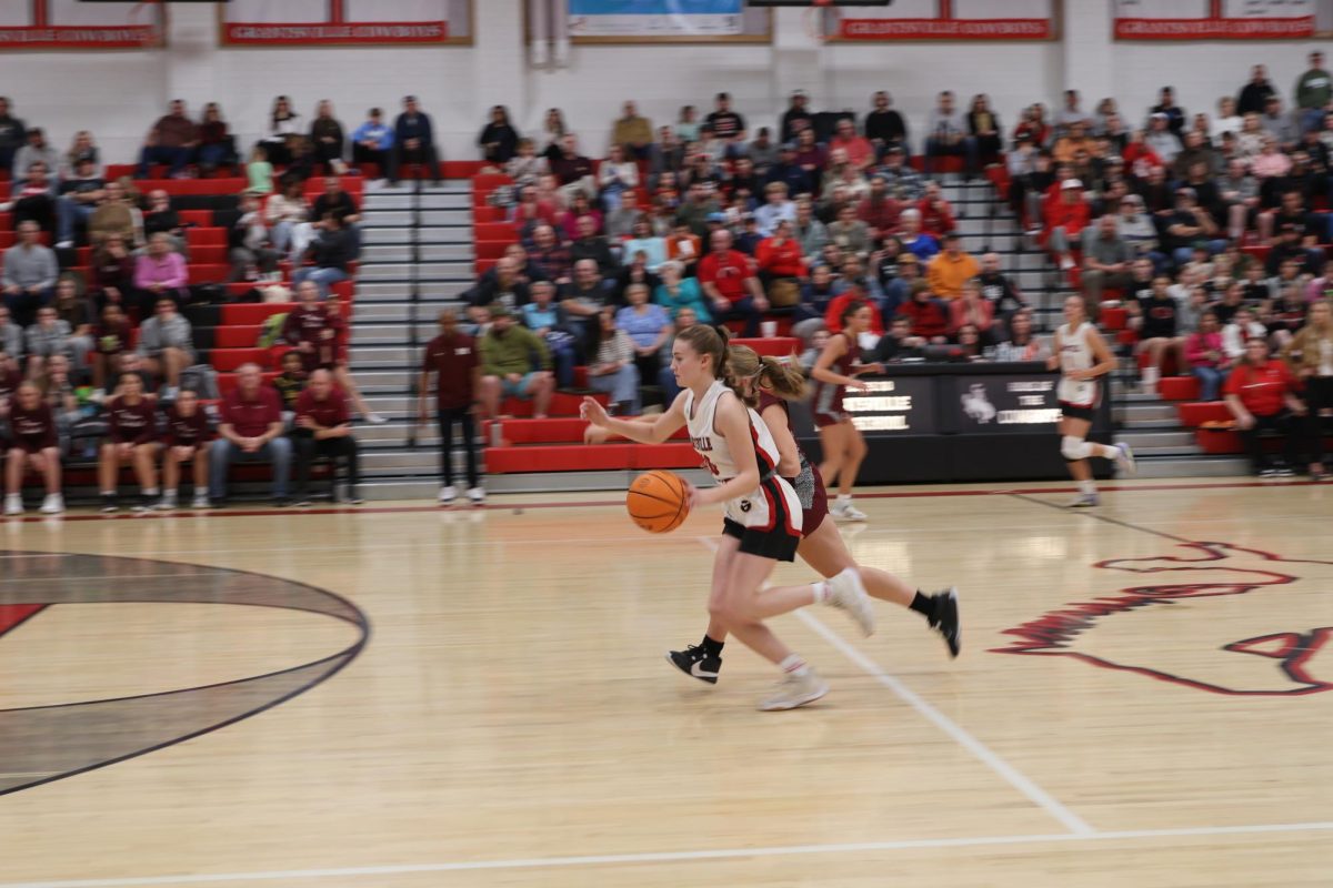 1/30/24 Girls Grantsville Basketball vs. our Rivals Morgan. Kodee Williams on her way to the hoop at GHS 