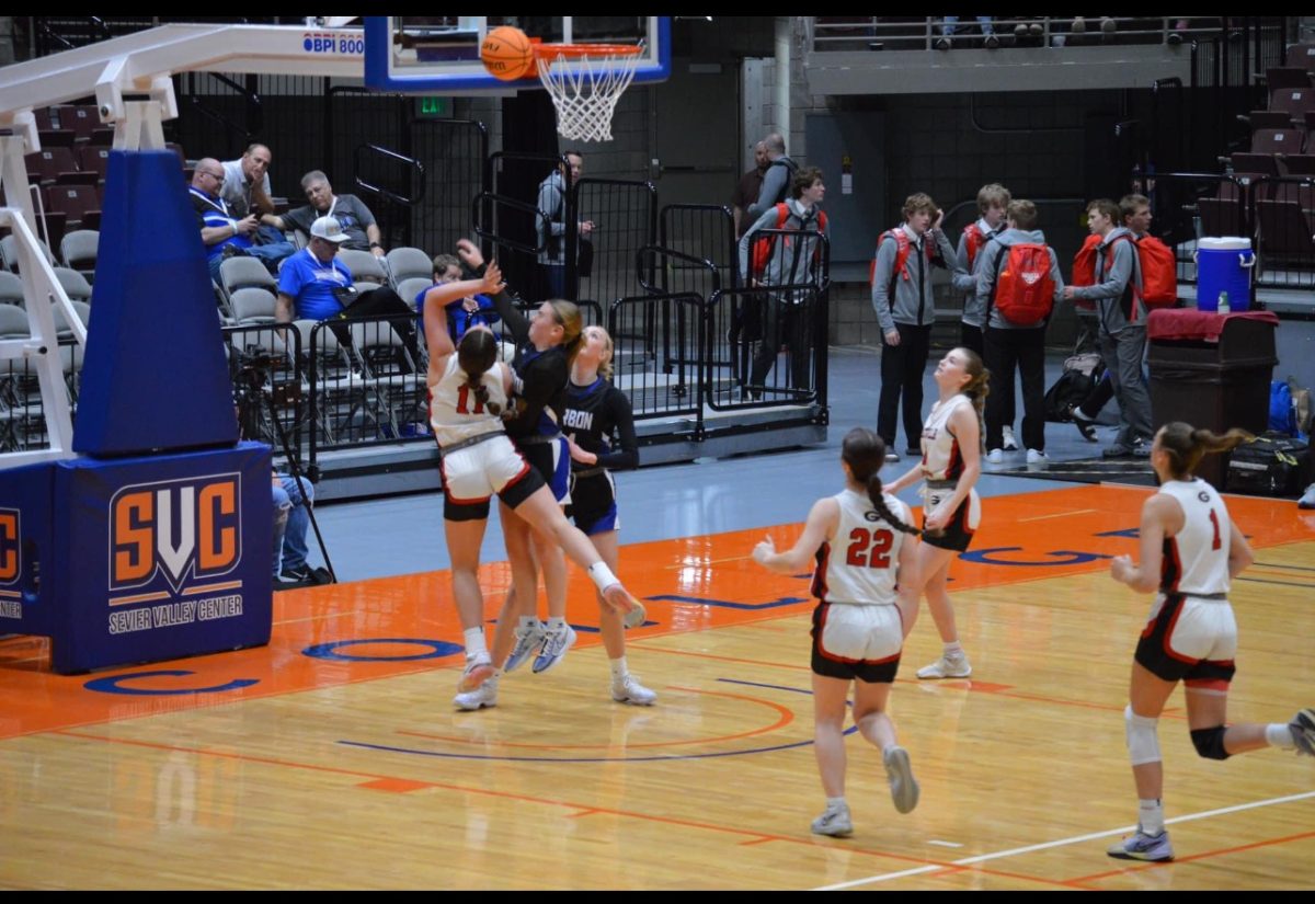 Avery Allred doing a layup at the Girls Basketball State Game on 2/24/24.