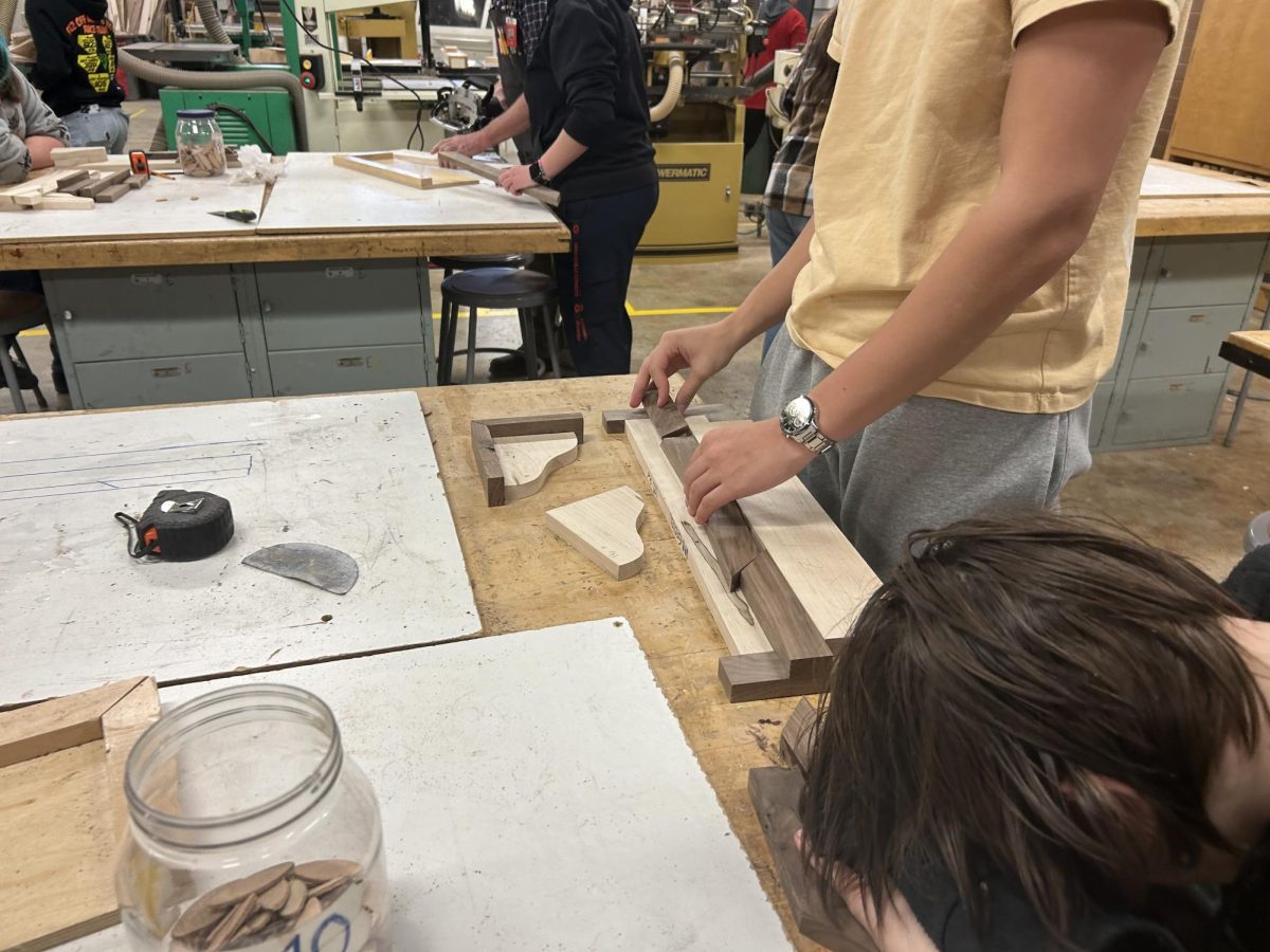 students working on their shelves for woods during 1st period.