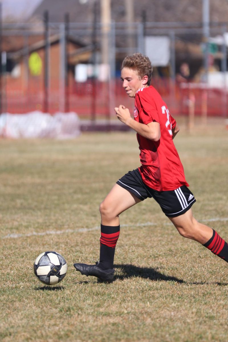 Nicolas Dutson at varsity soccer on 3/21/24 at GHS against Union High School.