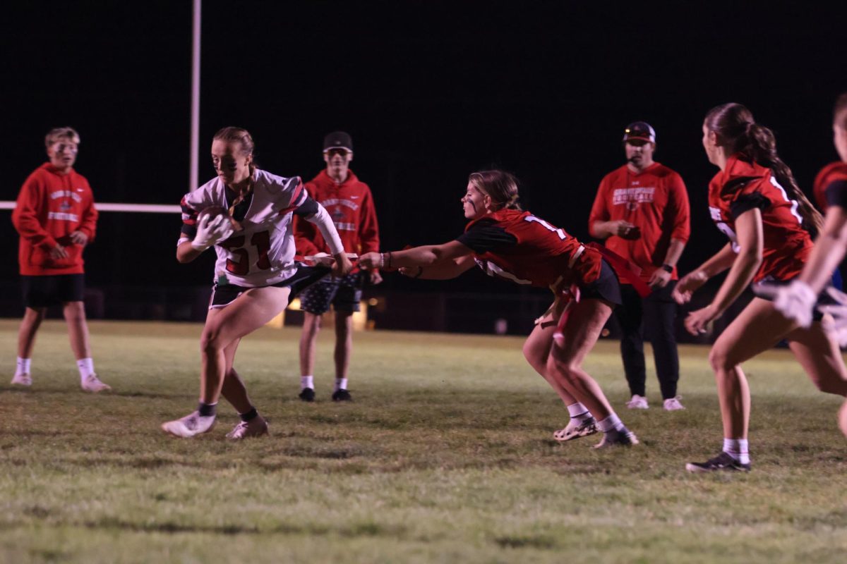 Brooke Kimber pulling  Lidnsey Wangsgard flag