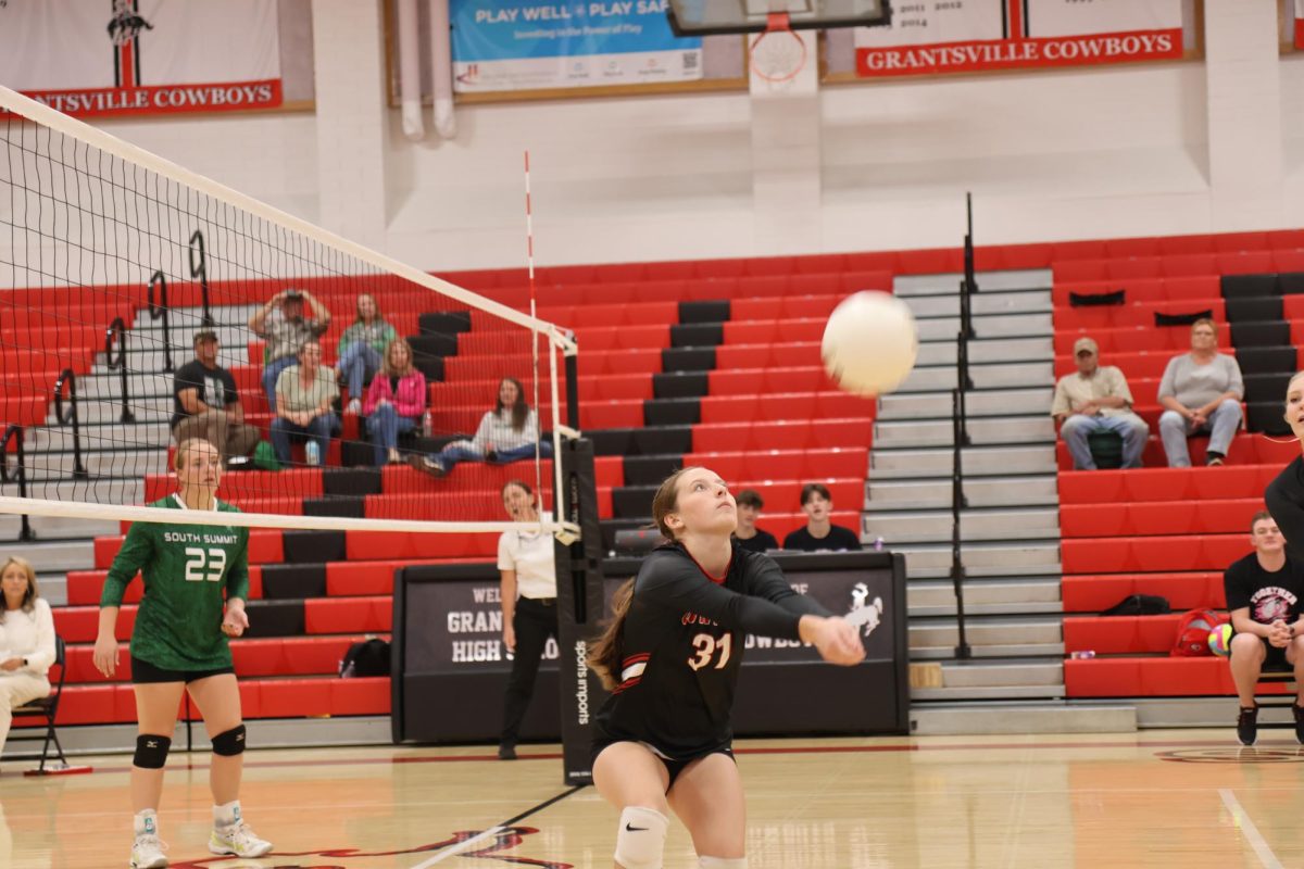 Wynnter Bell passing the ball to her pin