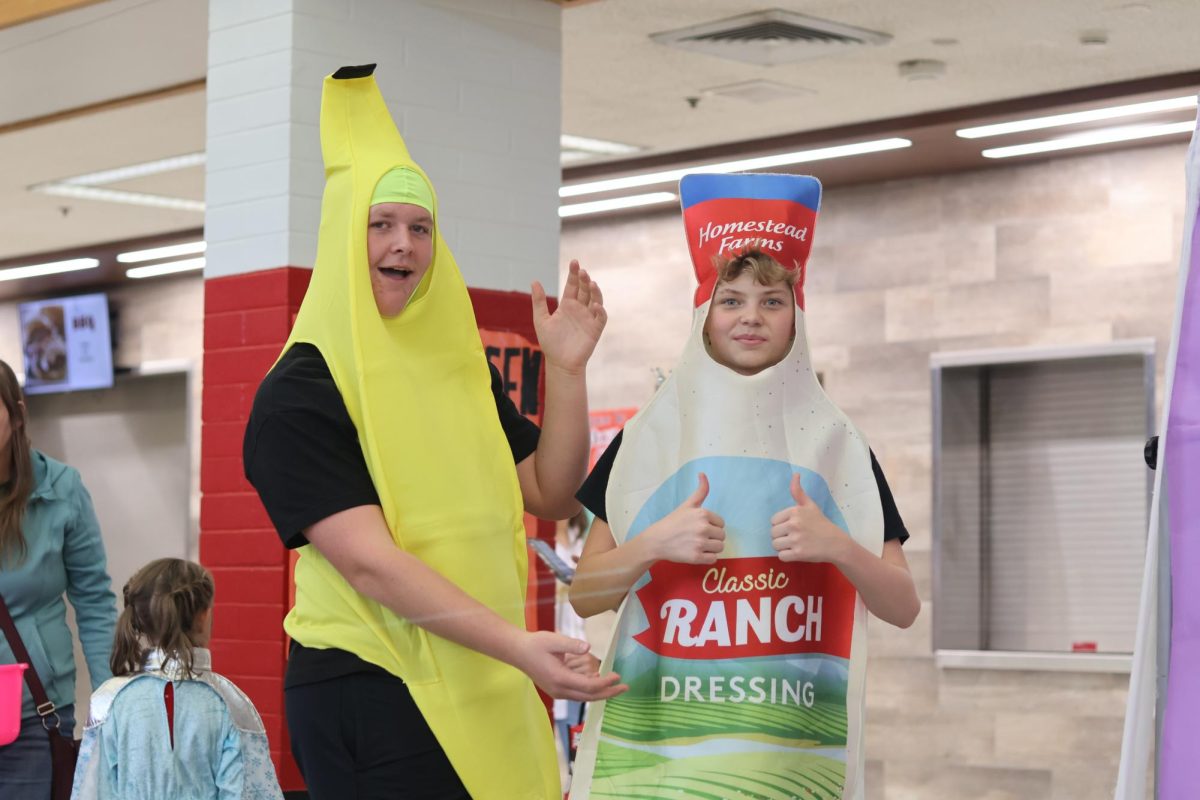 Kannon Fields and Jaren Keyes dresses up for the Halloween carnival 