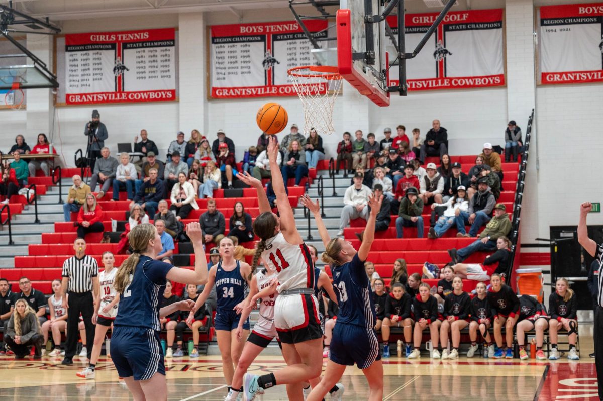 Avery Allred shooting layup against 13 copper hills