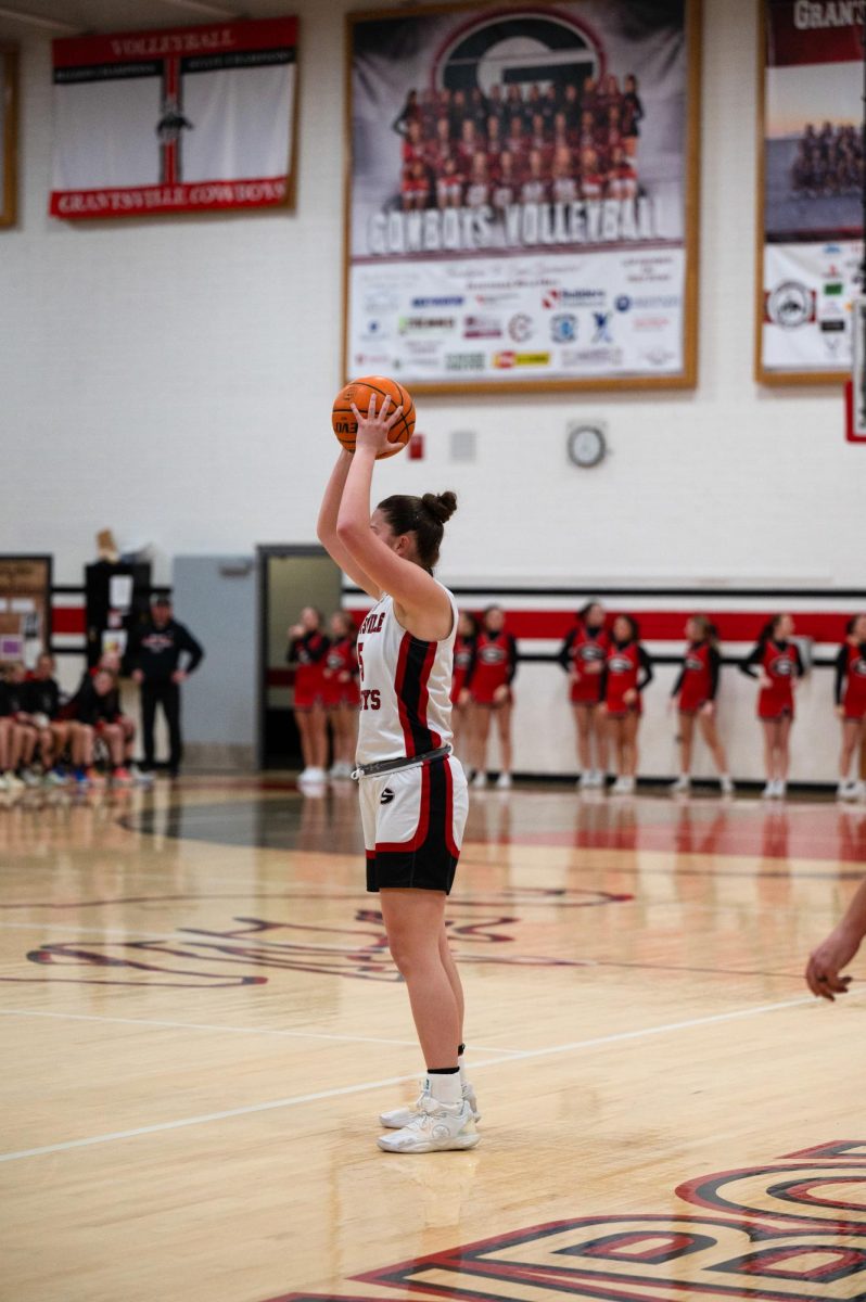 Alexis Egbertt passing the ball in girls game