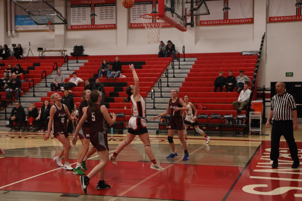 SaDee Castagno shooting a layup against Morgan 